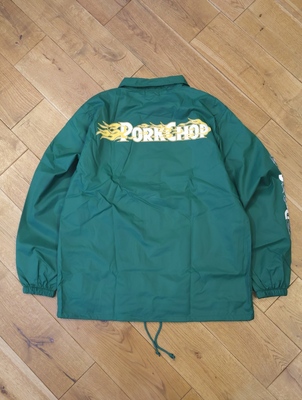 PORKCHOP GARAGE SUPPLY 「BURNING LOGO COACH JKT」 ナイロンコーチ
